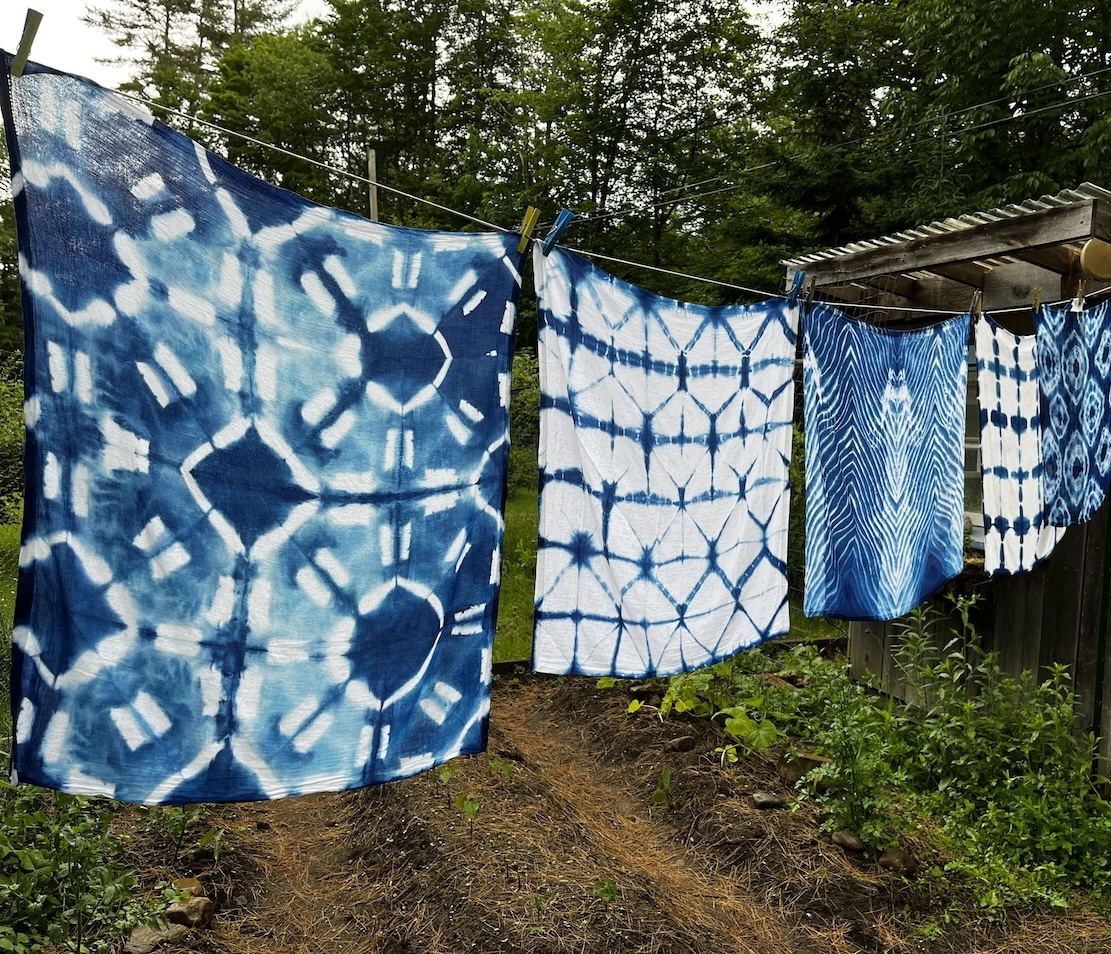 Indigo Shibori tea towels Indigo Shibori dyed tea towels on a clotheline