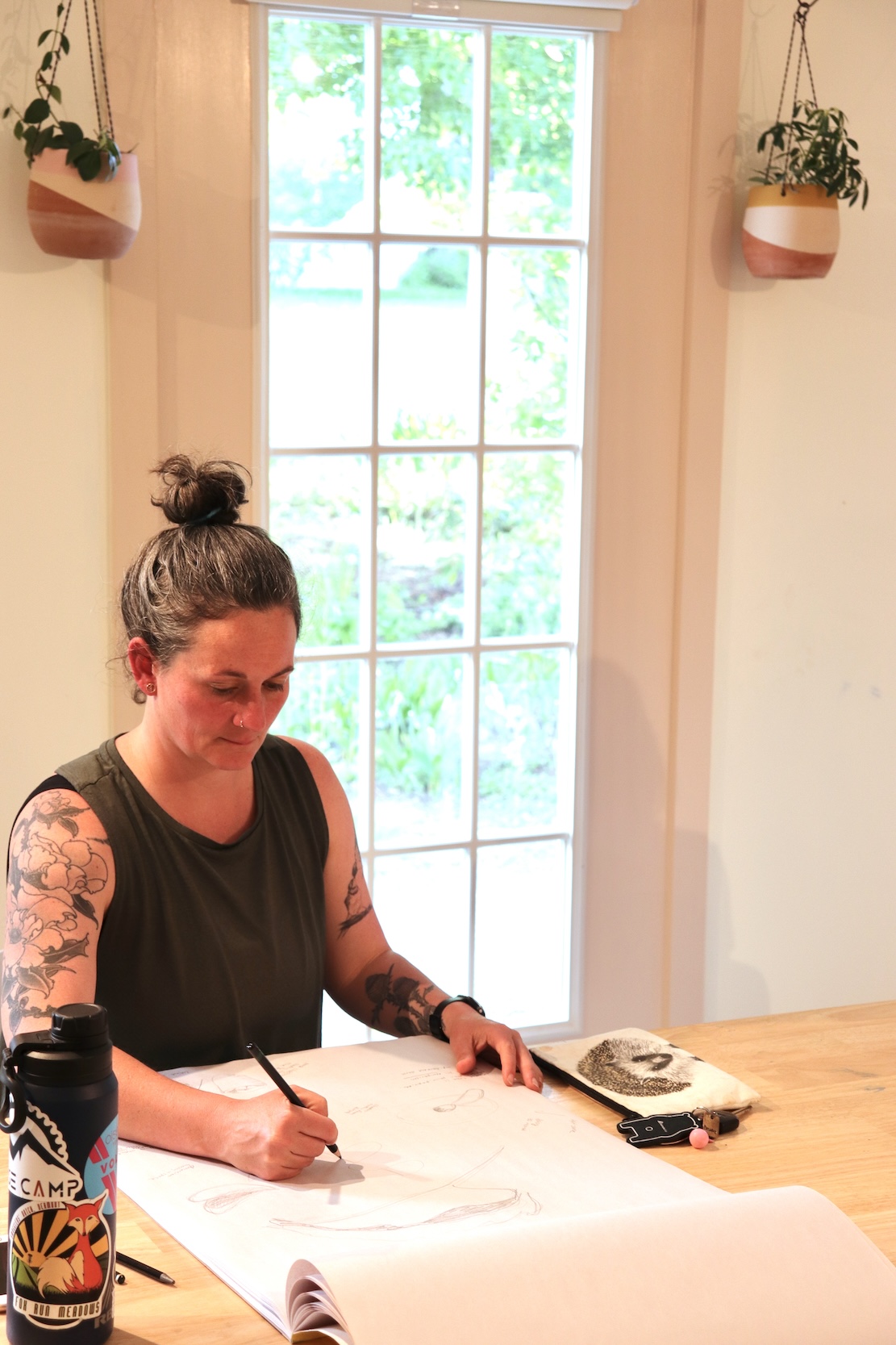 Student drawing in art studio