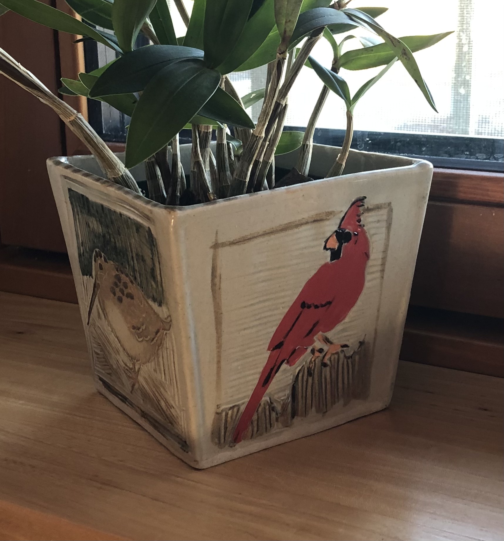 Handmade clay planter with textures bird design