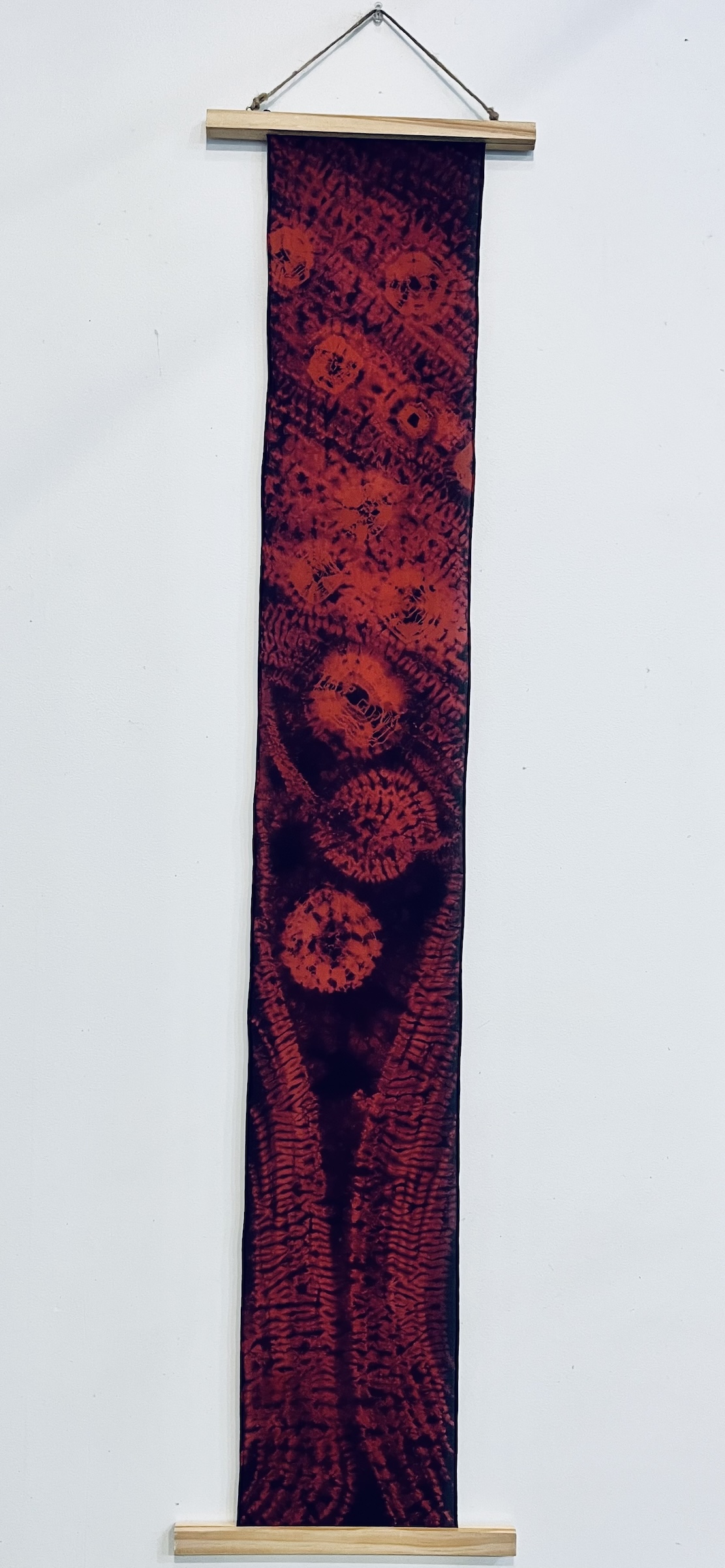 Cochineal dyed silk scarf with patterns