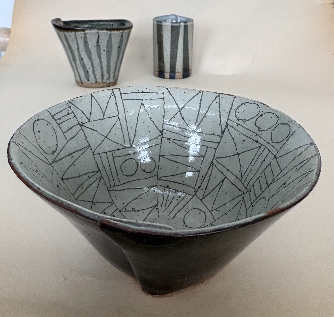 Hand built clay pieces with geometric designs